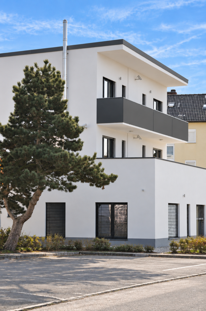 Umplanung eines Supermarkts zu einem Fünffamilienhaus – Weitere Ansicht